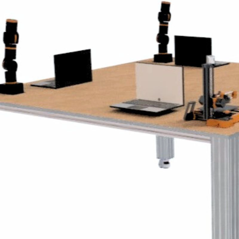 Modularer Schulungstisch mit kollaborativen Roboterarmen und Laptops für praxisnahe Industrie 4.0 Weiterbildung.